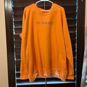 Orange seaside sweatshirt